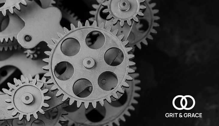 Interlocking gears showing leadership alignment and team effectiveness